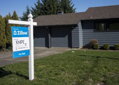 Zillow and Compass clash over online real estate listings