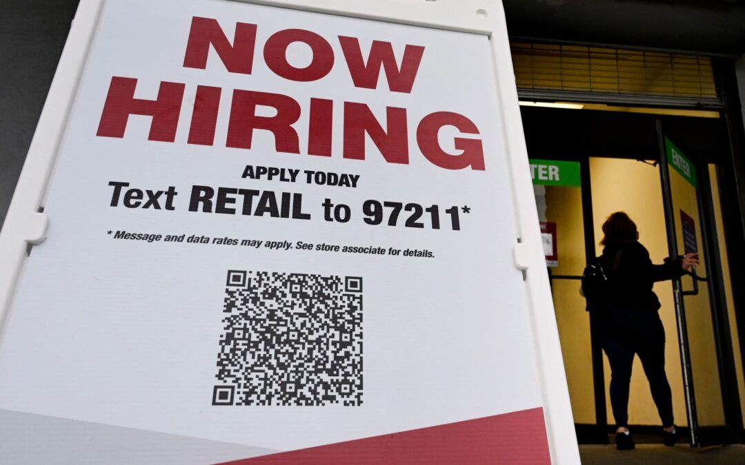 Jobs report: Retailers hire big, defying consumer warning signs