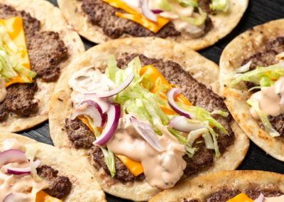 One Of The Best New Fast Food Items Of August 2026 Is A Burger Taco Hybrid