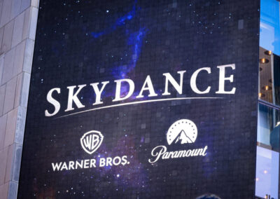 After tumultuous fight, Paramount completes takeover of Warner Bros to become Hollywood giant Skydance | PBS News